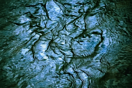 abstract background painted dark blue water surfaceの写真素材