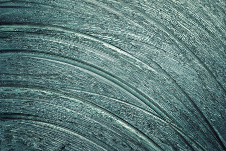 abstract background silver lard triturated on a baking sheet