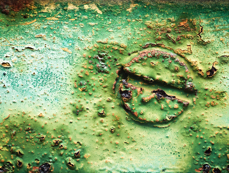 background or texture rusty screws painted in green colorの写真素材