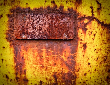 background or texture yellow old rusty labelの写真素材