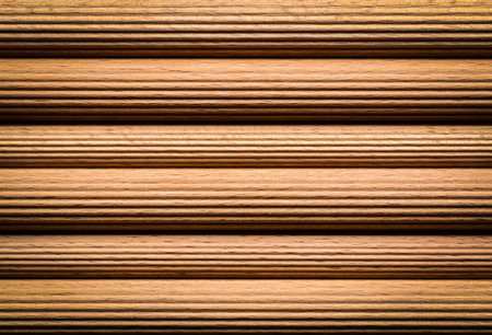 background or texture notched wooden sticks with hardwood