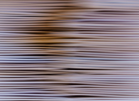 abstract background blurred horizontal sheets of paperの写真素材