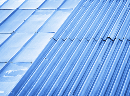 abstract background or texture blue two types of metal roofsの写真素材