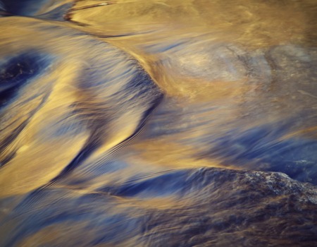abstract background blurred autumn water level of the riverの写真素材