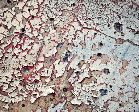 abstract background or texture peeled colored paint on a concrete wall