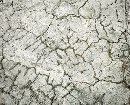 abstract background or texture cracked surface cement plastersの写真素材