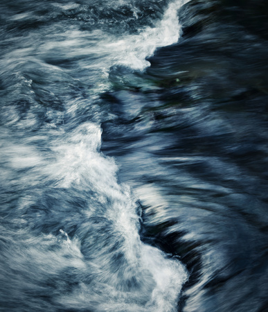 abstract dark background detail on the rapids of the riverの写真素材
