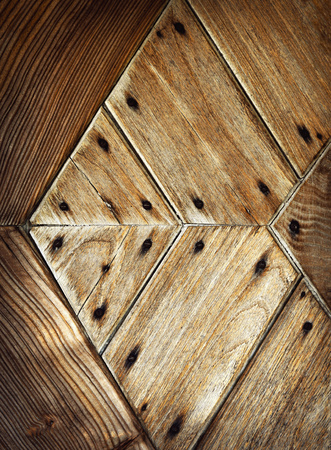 abstract background or texture detail pattern on old wooden doorの写真素材