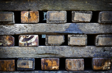 background or texture stacked railway sleepersの写真素材