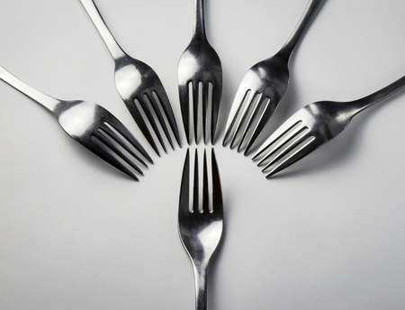 forks abstract composition on white backgroundの写真素材