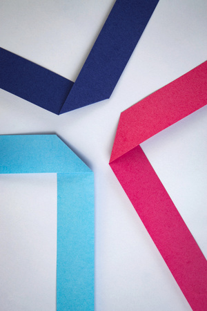 abstract background composition of colored paper ribbonsの写真素材