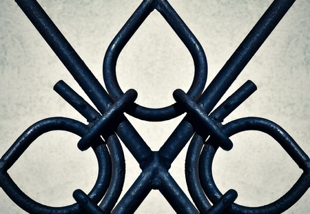 abstract background dark detail ornamental iron gatesの写真素材