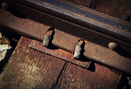 background Detail of an old rusty rail jointの写真素材