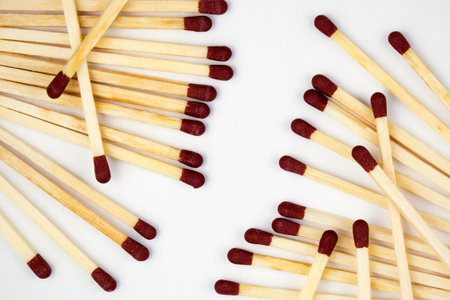 composition of spilled box of matches on a white background