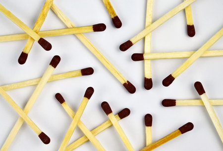 composition of spilled box of matches on a white backgroundの写真素材