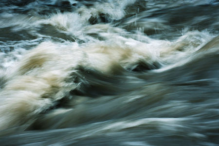 background Abstract detail of a strong wild riverの写真素材