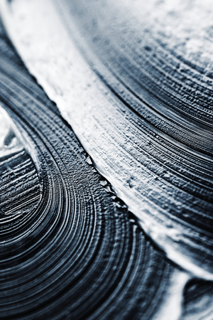 abstract background white fat smeared on sheet metalの写真素材