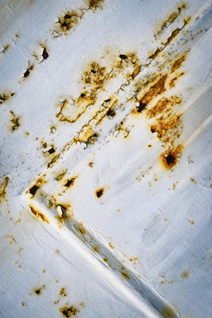 abstract background detail of old white rusty metal plate
