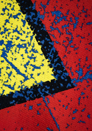 background red and yellow detail of old painting on textile