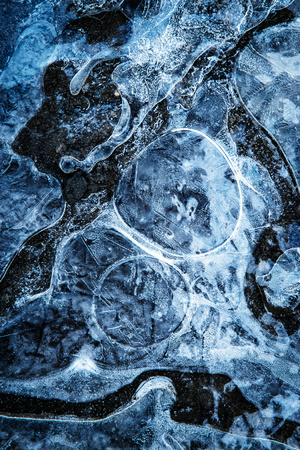 Abstract background or texture arc lines on frozen water levelの写真素材