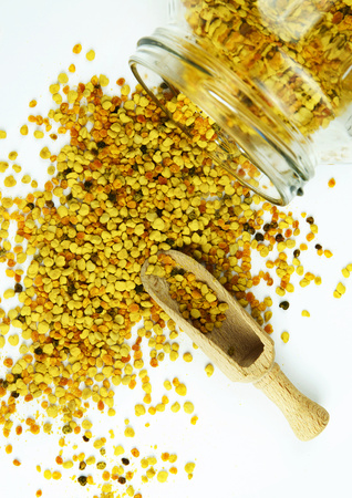 food background pollen sprinkled with a glass bottleの写真素材