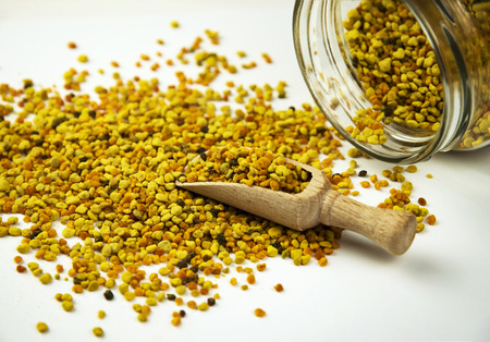 food background pollen sprinkled with a glass bottleの写真素材