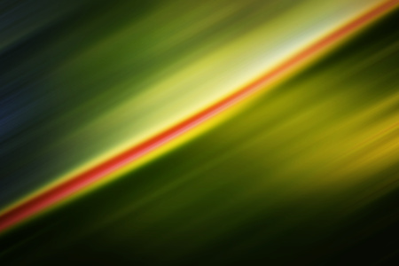 abstract red blured smudges on a green backgroundの写真素材