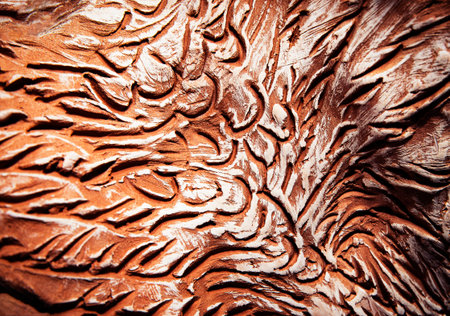 abstract background or texture pattern scraped into brown clayの写真素材