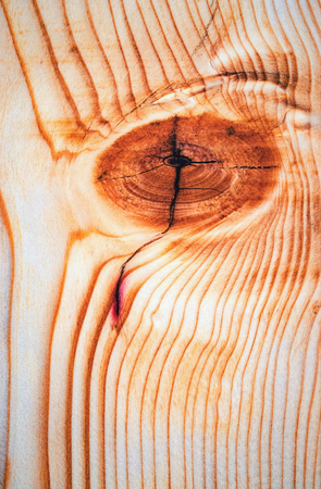 abstract background or texture  bloody knot on a wooden boardの写真素材