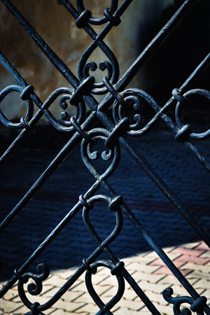 abstract background detail black iron forged gateの写真素材