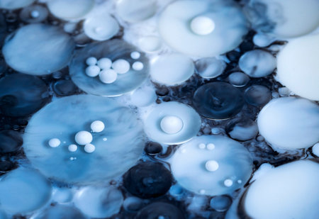 abstract background white oil beads in solutionの写真素材