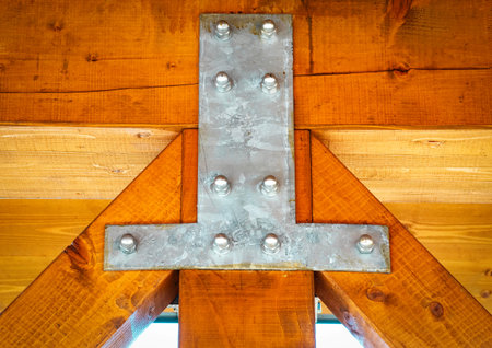 background or texture iron sheet connects wooden beams