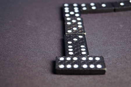 Domino dice close-up. Black background. Blur effect.の写真素材