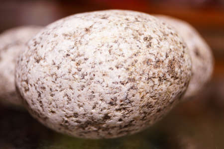 Pebble stone, sea pebbles. Pebble stone, sea pebbles. They lie on the glassの写真素材