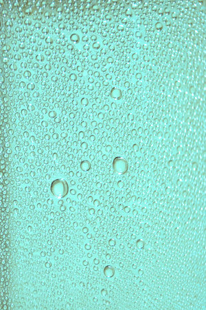 Water drops background. Selective focus.