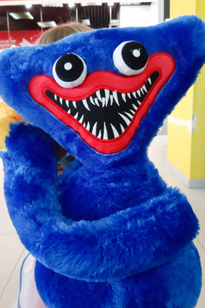 Huggy wuggy blue with a huge jaw.の写真素材