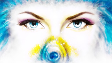 women eyes looking up mysteriously from behind a small rainbow colored peacock feather. Eye contactの写真素材