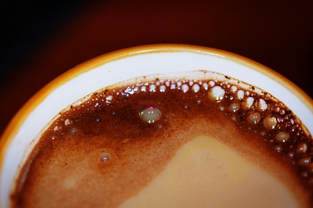 coffee cup on green  background .の写真素材