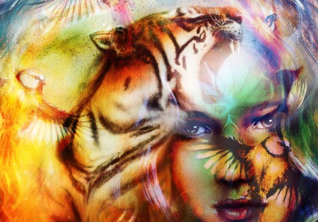 painting mighty lion and  tiger head, and mystic woman with bird, ornament background. computer collage, profile portrait, eye contactの写真素材