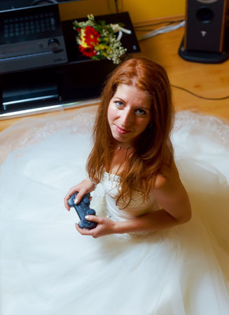 Bride game computer game while sitting on the carpet