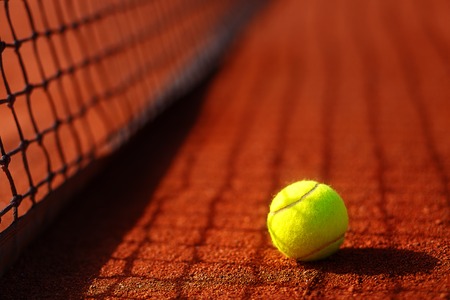 tennis court with tennis ball and antuka backgroundの写真素材