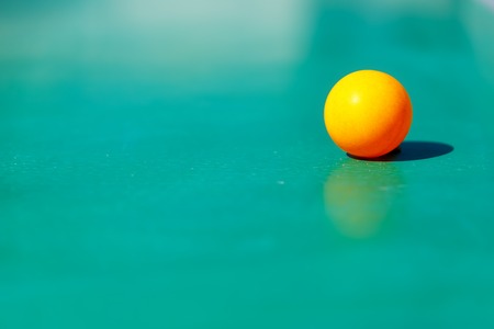 details of table tennis with playing equipment and yellow ballの写真素材