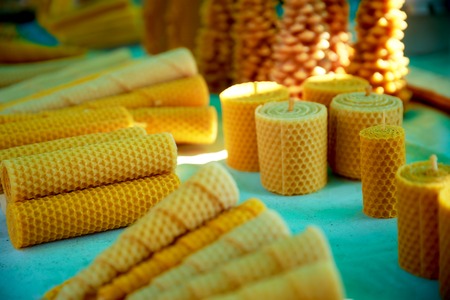 set of wax candles of different shapes and structuresの写真素材