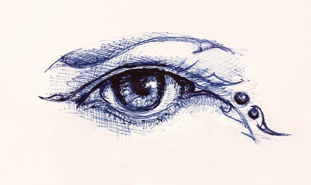 Drawing of woman eye on graphic background with ornament.の写真素材