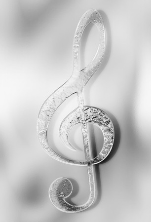 Music clef on abstract background. Music concept. Glass and metal effect.の写真素材