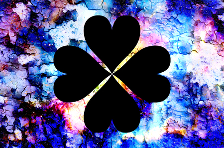 four-leaf clover from heart and color cosmic abstract background and crackle effectの写真素材