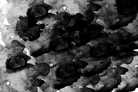 abstract black splashes on white watercolor paper. monochrome image.の写真素材