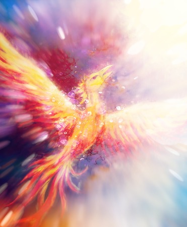 Flying phoenix bird as symbol of rebirth and new beginning.の写真素材