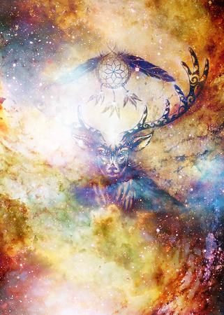 sacred ornamental deer spirit with dream catcher symbol and feathers in cosmic space.の写真素材