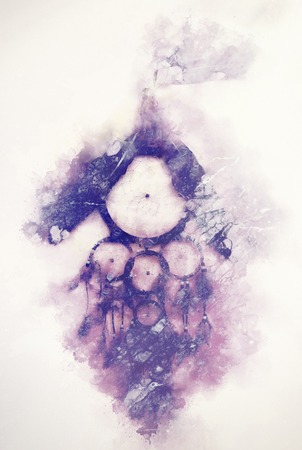 dream catcher with eagle and raven feathers and abstract background.の写真素材